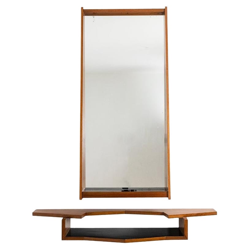 Mirror and mahogany console. 1970s.