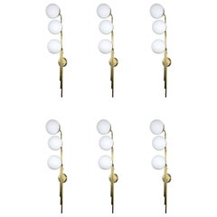 Set of Six Tall Brass and Globe Wall Sconces