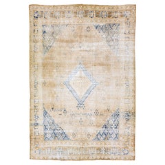 Antigua alfombra persa de lana beige hecha a mano con diseño de medallón de los años 20