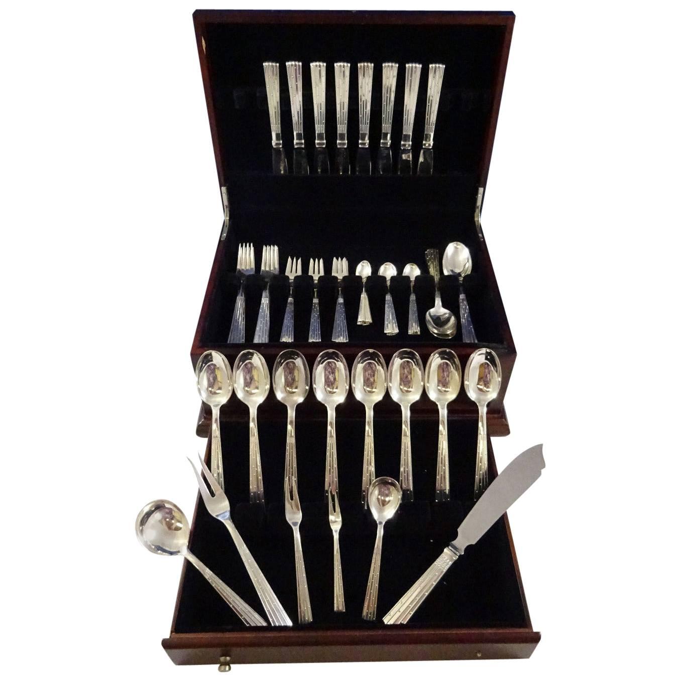 Rare Champagne by Mogensen Danish sterling silver flatware set, 62 pieces. The handle design resembles modernist interpretation of a glass of champagne with tiny bubbles.
 
8 dinner knives 8 1/4