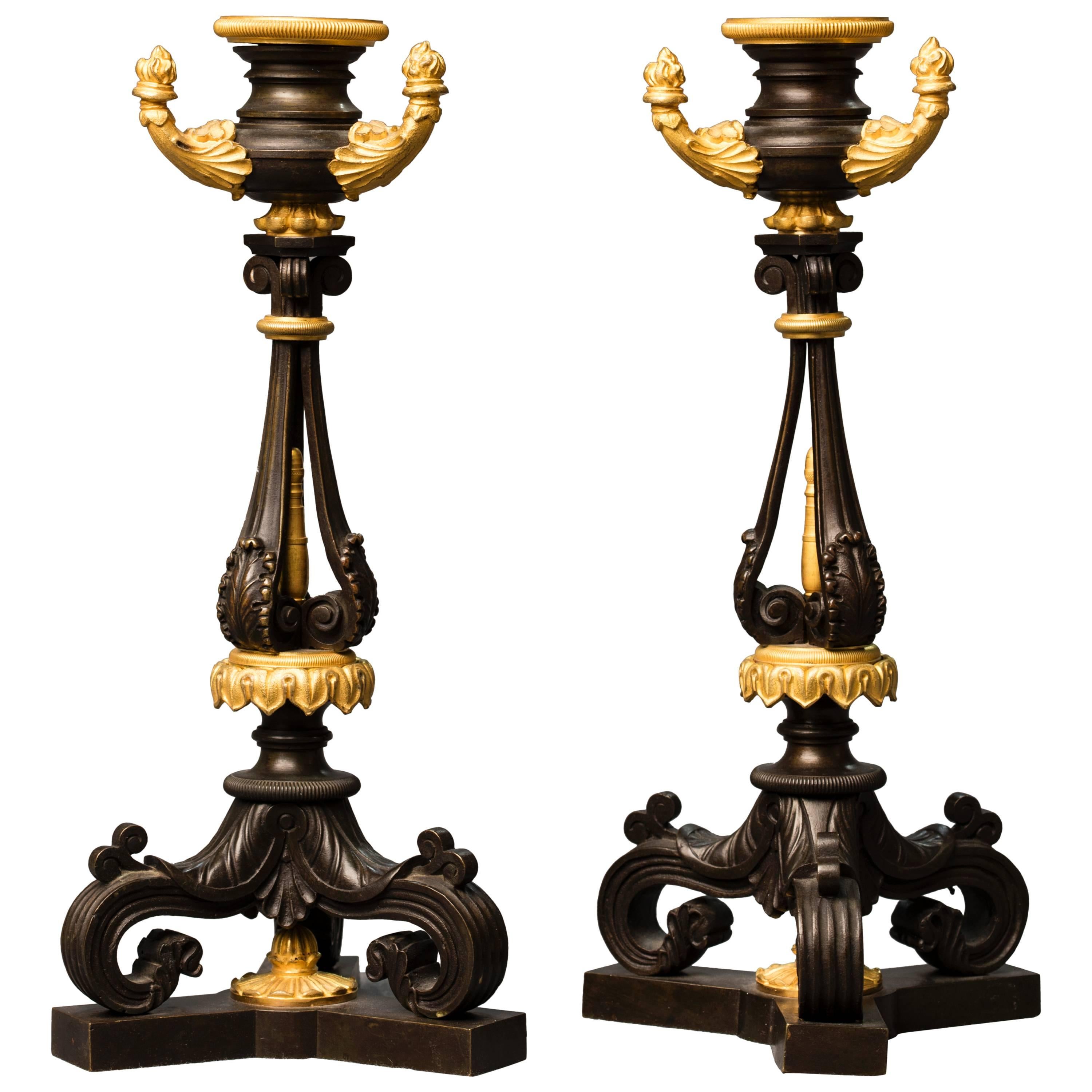 Fine and Unusual Pair of Gilded and Patinated Empire Candlesticks