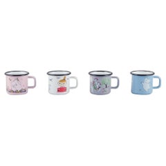 Muurla, Finland. Four enamel mugs with motifs from the Moomins stories, 21st C