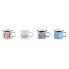 Muurla, Finland. Four enamel mugs with motifs from the Moomins stories, 21st C