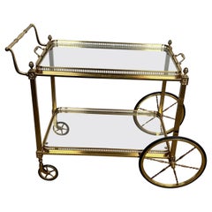 Neoclassical Style Brass Drinks Trolley with Lily Flowers. Maison Baguès.