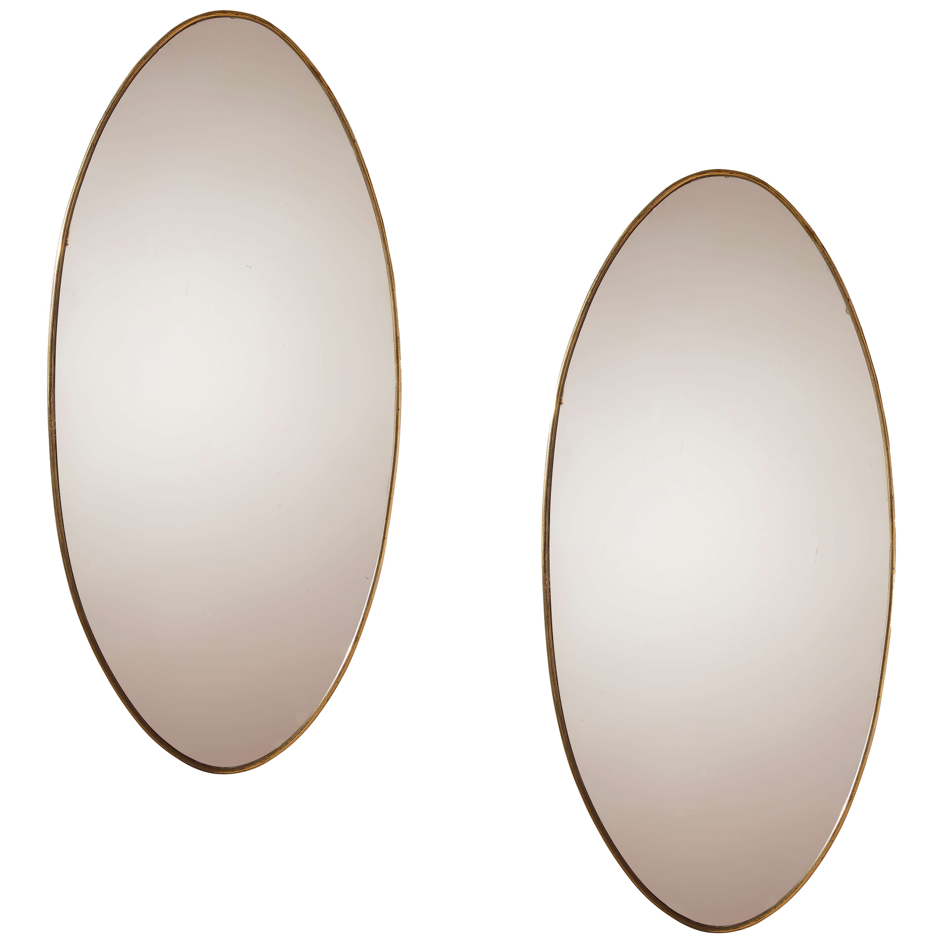A pair of oval brass mirrors, Italy, 1960s