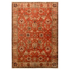 Antico Sultanabad Rugs in stile persiano con motivi floreali in rosso e verde.