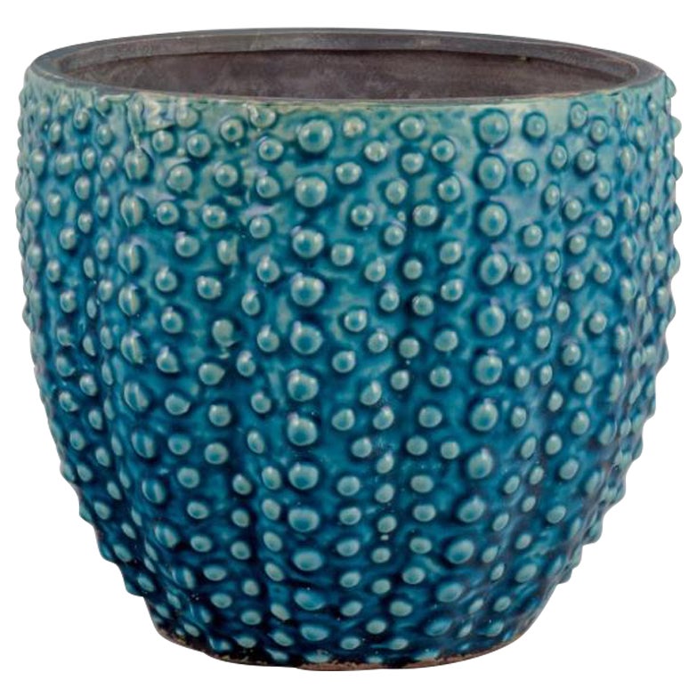 European studio ceramist. Large ceramic flower pot holder. Turquoise glaze.