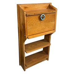 An oak Guillerme et Chambron night stand