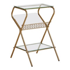 Mesa auxiliar francesa de latón y cristal estilo Maison Jansen, años 60