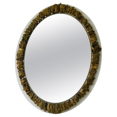 Specchio ovale con pietra d'oro e agata in stile Line Vautrin.