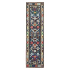 Tapis de course Dhurrie à motifs géométriques colorés de Rug & Kilim