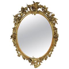 Louis Philippe Carved and Giltwood Oval Mirror