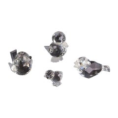 Swarovski, Austria. Four miniature bird figurines in faceted cut crystal glass.