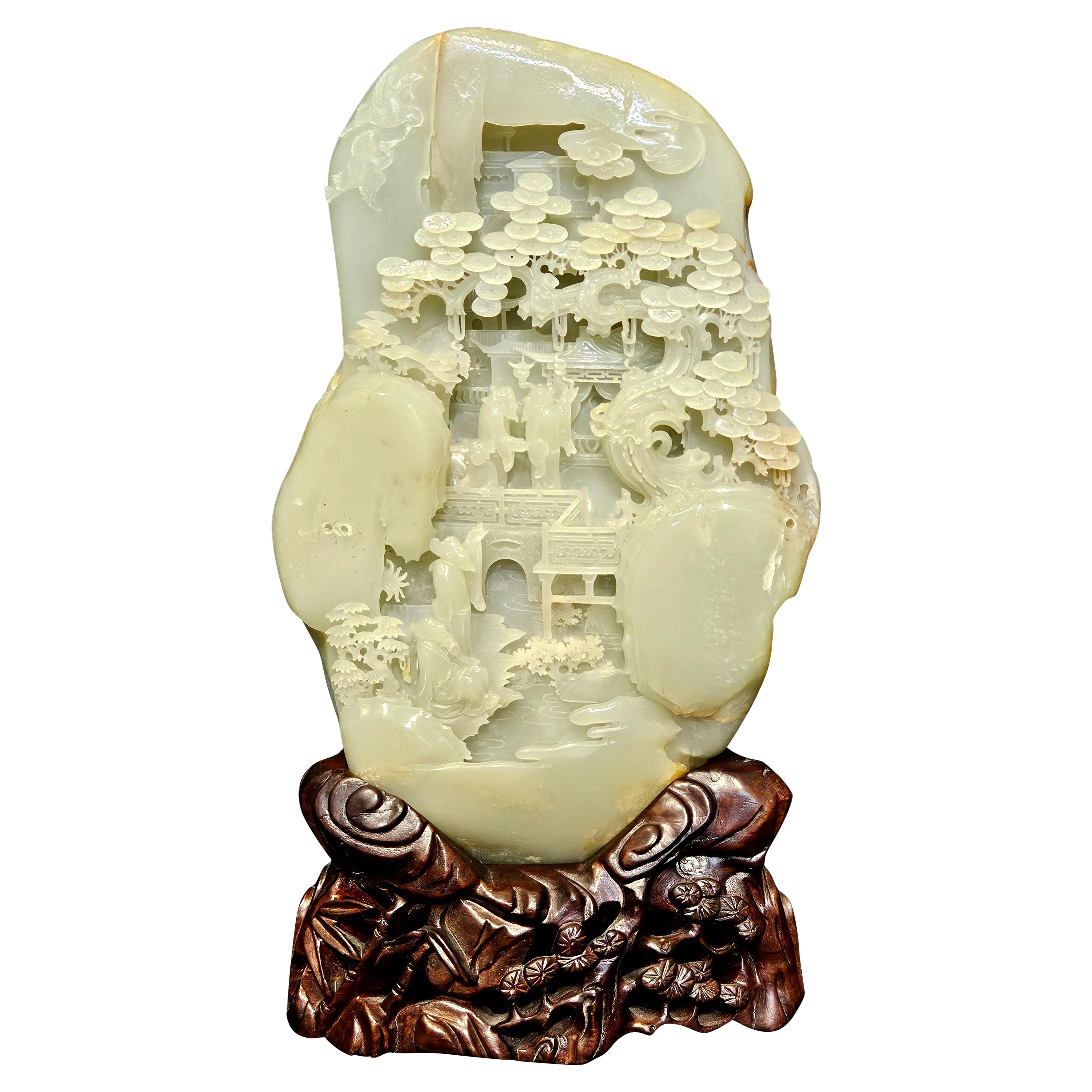 Chinese Large Boulder Carved Light Celadon/ White Jade with A Mountainside Scene