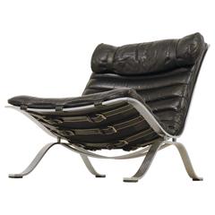 Silla Ari de cuero negro de Arne Norell, Suecia