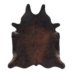Rug & Kilim’s Extra Large Cowhide Rug in Deep Brown Tones