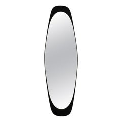 Grand miroir mural Mid Century en laiton avec cadre en verre noir exceptionnel