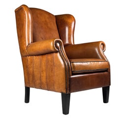 Sillón orejero de piel de oveja