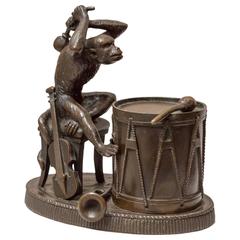 Whimsical Bronze Sculpture of a One Man Monkey Band