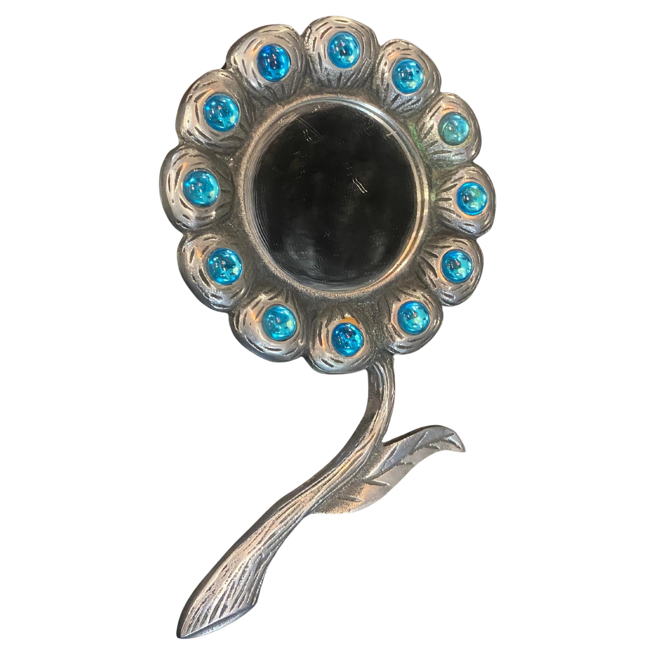 2 petits miroirs en fonte d'aluminium et pierre bleue circa 1970 en vente