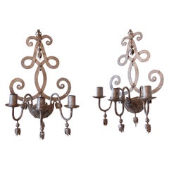 1970s  Pair of Iron Wrought Wall Sconces with Classic Design and Candle Holders