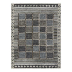 Tapis de style scandinave à motifs géométriques bleus, bruns et gris de Rug & Kilim