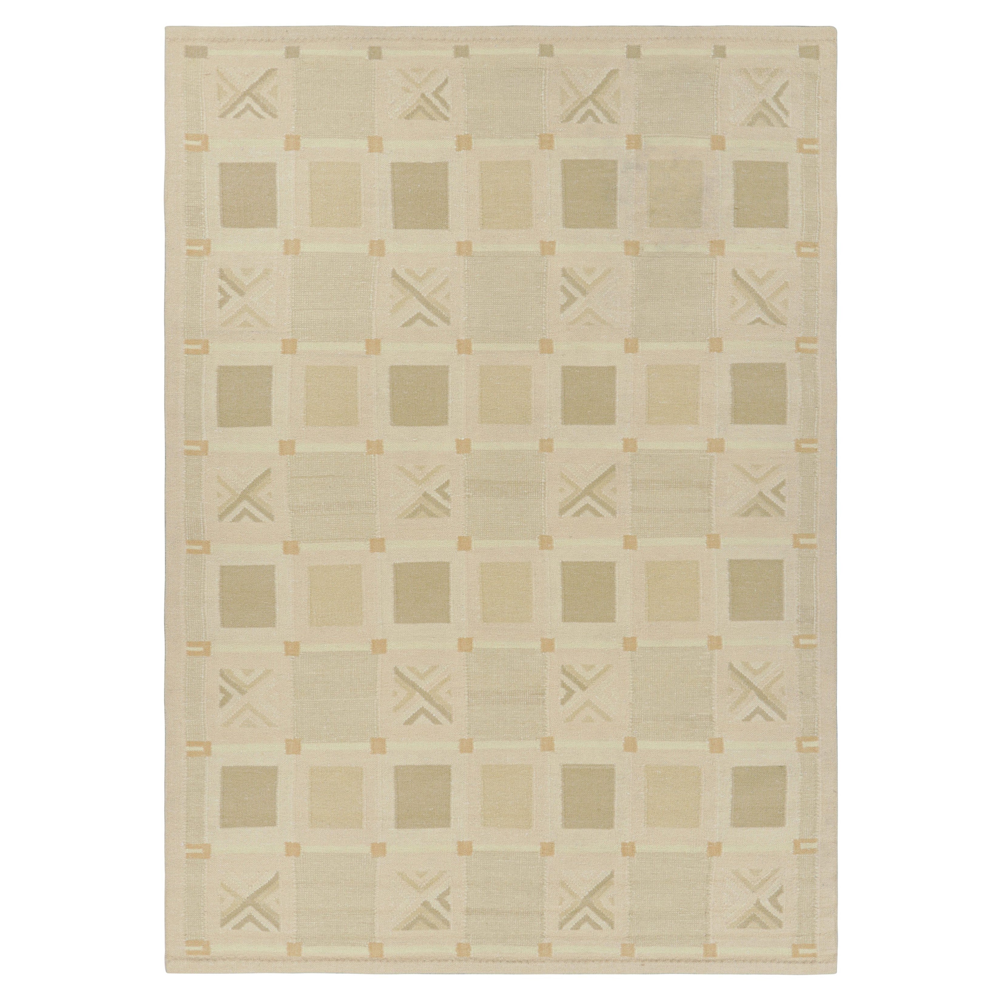 Tapis de style scandinave rose et crème à motifs géométriques de Rug & Kilim