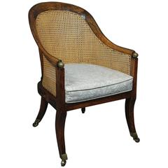 Regency Faux Rosewood and Brass-Mounted Caned Bergere Chair