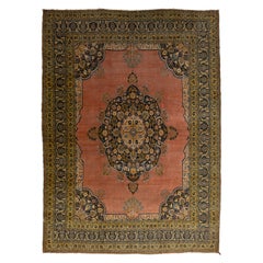 Tapis Tabriz ancien fait à la main en terre cuite avec un motif central