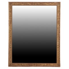 A French Empire gold mirror, 19th C.