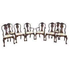 Set of eight walnut dining chairs