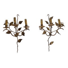 Pair of 3 Lights Gilt Metal Wall Sconces with Leaves. French work. Circa 1970