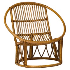 Silla auxiliar compacta de ratán firmada por Hudon - Francia Años 60