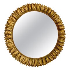 Giltwood Sunburst Mirror with Elegant Decor