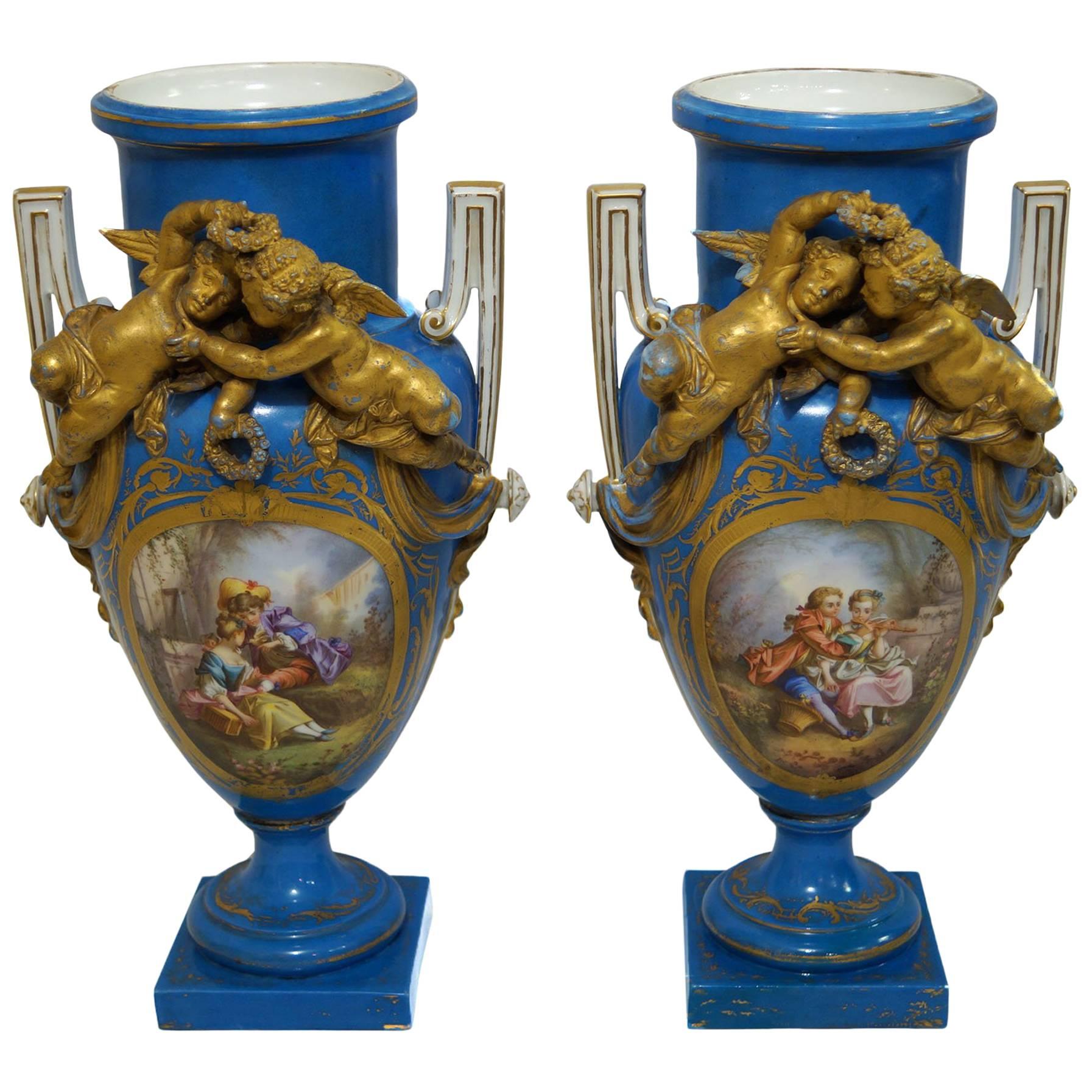 Pair of French Celeste Blue Porcelain Sèvres Style Figural Vases