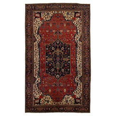 Tapis persan ancien Heriz en laine rouge avec motif de médaillon, années 1880