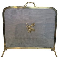 Brass Fireplace Screen with Mandolin Decorations and Bouquet of Flowers