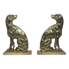Pair of Bronze Andirons Representing Dogs. French work From Art Deco Period