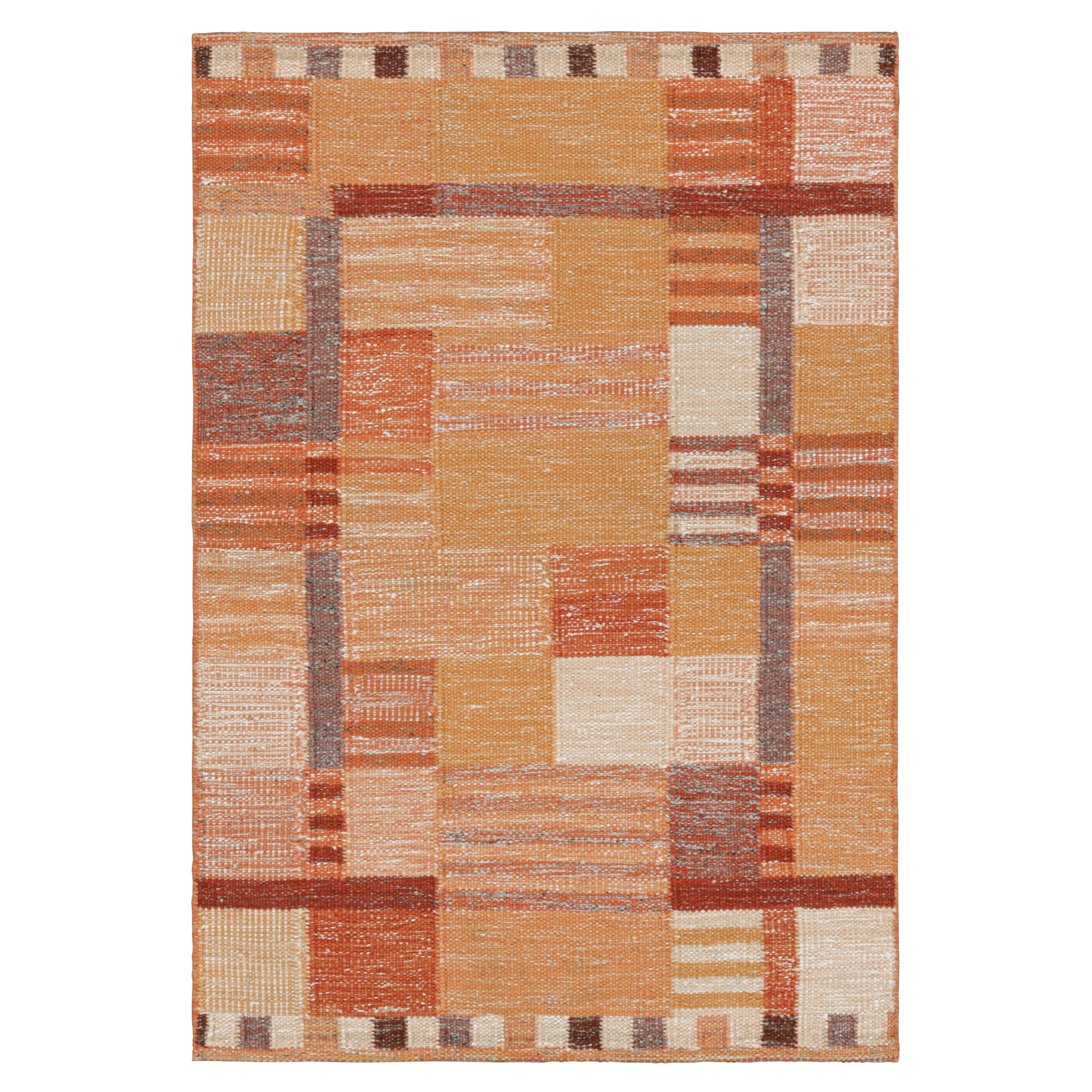 Tapis de style scandinave orange et rose à motifs géométriques de Rug & Kilim