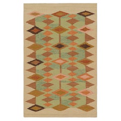 Rug & Kilim’s Scandinavian Style Rug in Beige, Green and Blue Geometric Patterns