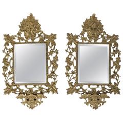 Pair of Mirrors in Gold Gilt Bronze with 
Faune Heads
