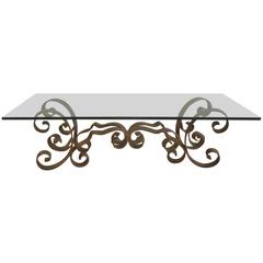 Gilt Iron and Thick Glass Top Cocktail Table