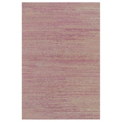Alfombra de textura Rug & Kilim en rayas rosa y beige