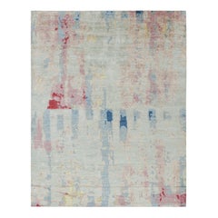 Rug & Kilim’s Abstract Rug in Blue with Pink and Red Accents