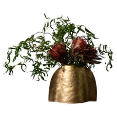 Two Handed Vessel, by Jordan Hufnagel in solid brass and silver