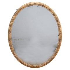 Grand miroir ovale mercuré William IV du 19ème siècle