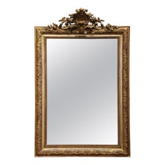 19th Century French Louis XV Carved Giltwood Mirror with Foliate Shell Motif