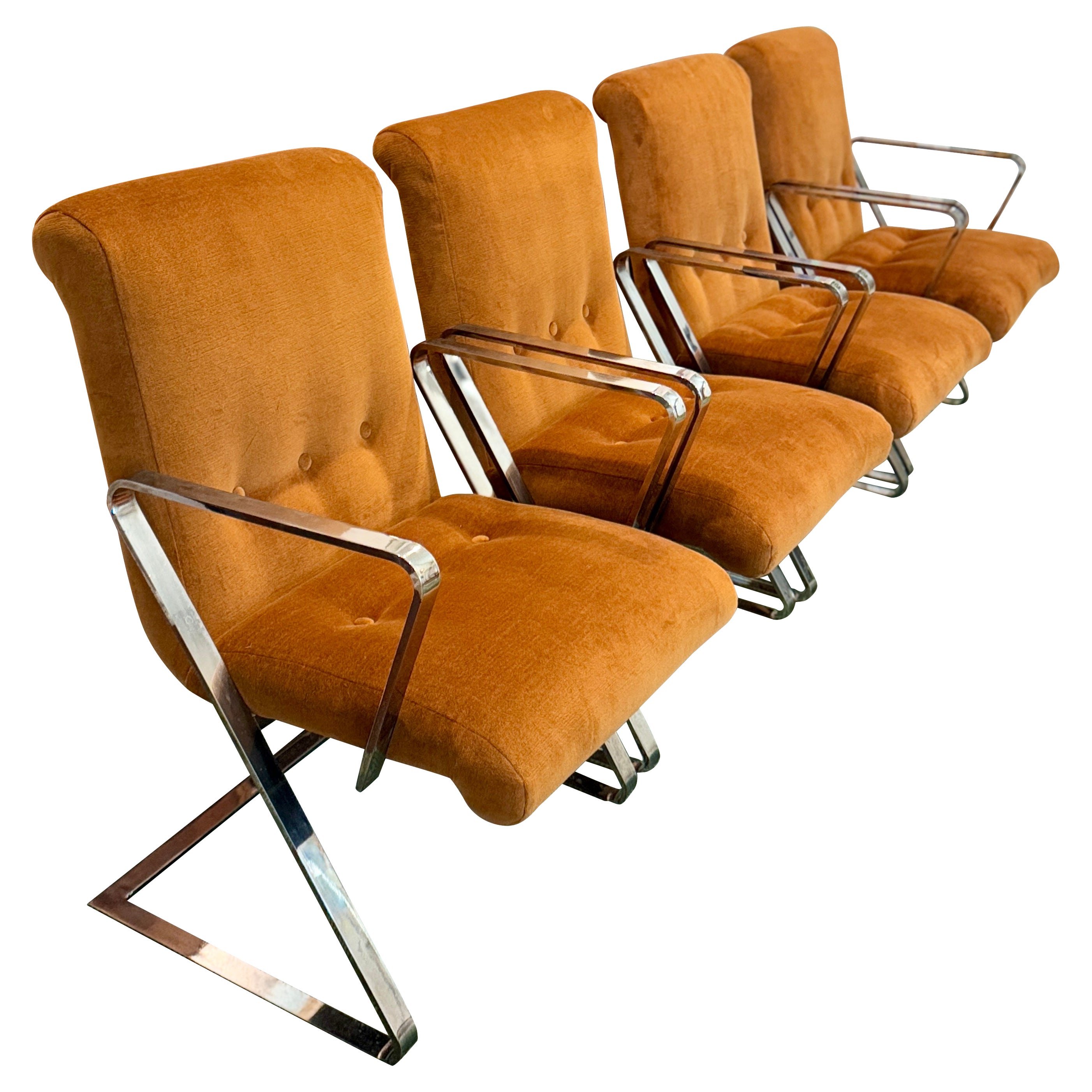 A l set of 4 cantilevered a shaped dining chairs by Chromcract in brown velvet