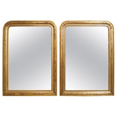 Pareja de espejos franceses dorados estilo Louis Philippe del siglo XIX, plata, bole rojo
