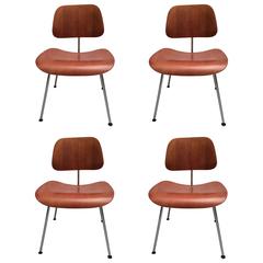 Eames Set of Four American Walnut DCM Chairs